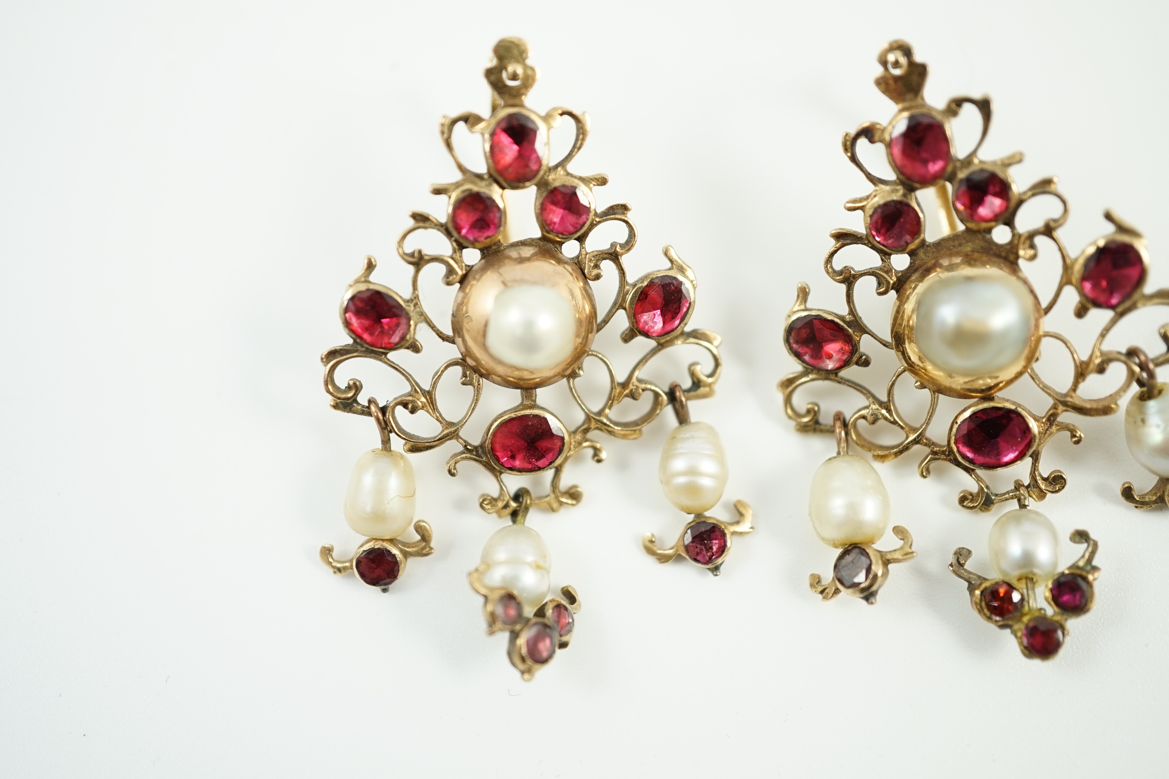 A pair of Indian yellow metal, cultured pearl and foil backed gem set cluster drop earrings, 43mm, gross weight 10.7 grams.